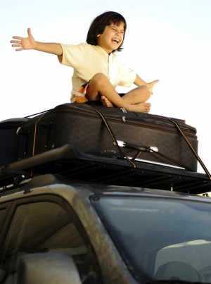 Child on car roof